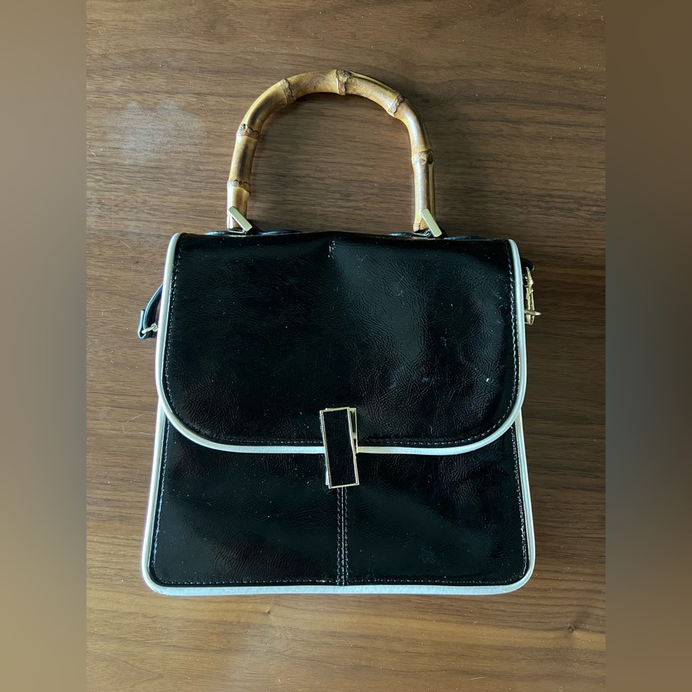 Black purse with wooden handle